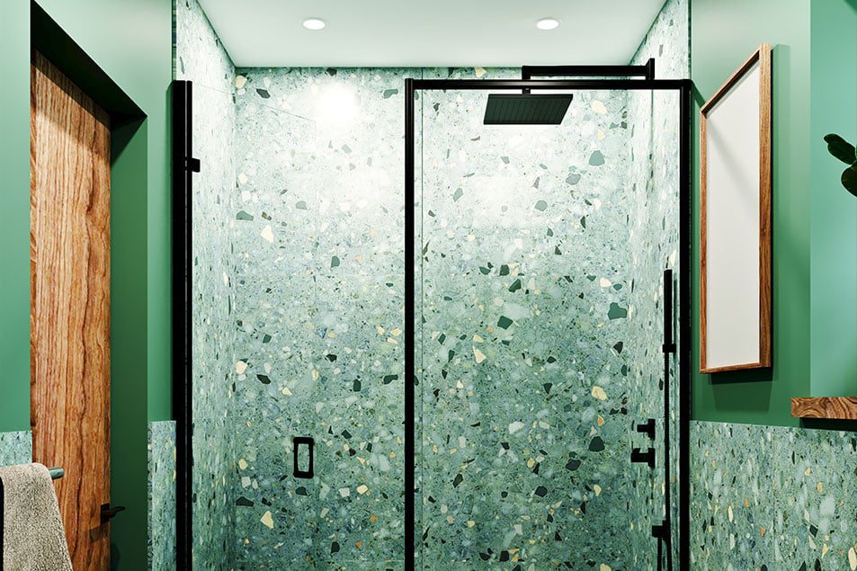 black shower screens bright tiles