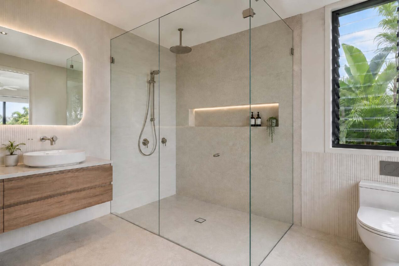 Contemporary Australian bathroom featuring a frameless glass shower screen with clear glass and minimal hardware