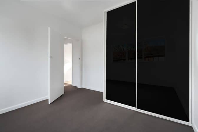 black glass sliding wardrobe doors