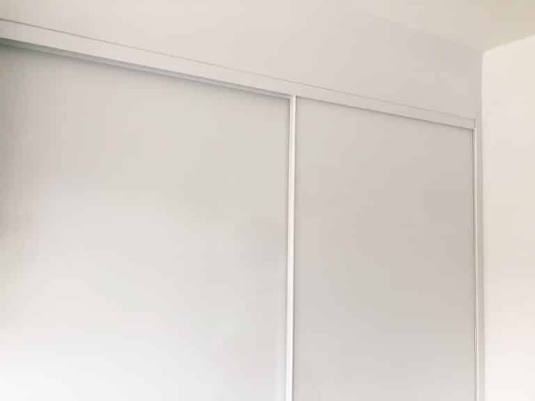 white frameless sliding doors
