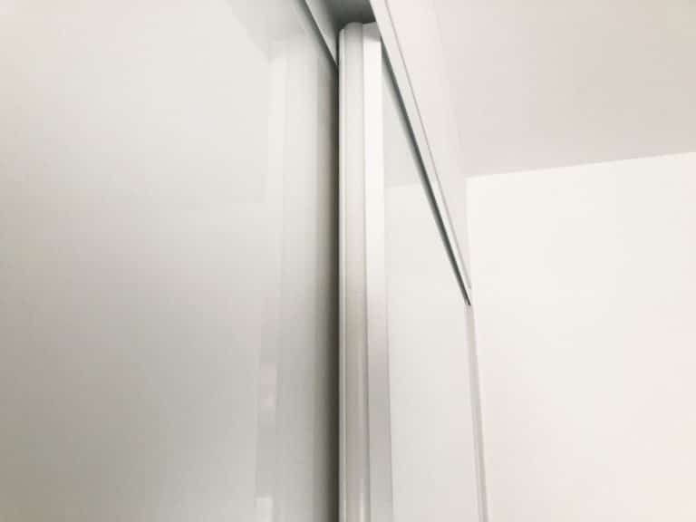 frameless white glass sliding doors
