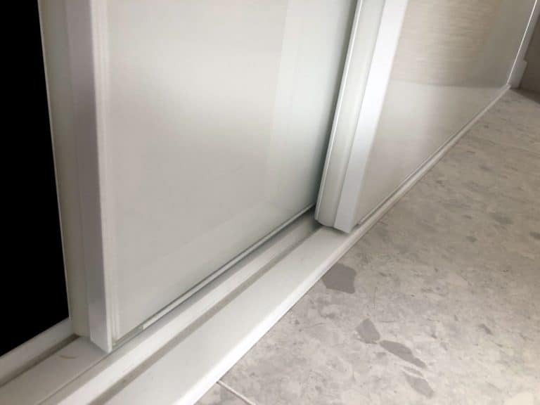 white glass frameless sliding doors