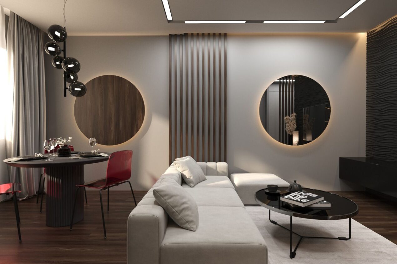 A living room styled with round contemporary mirrors on the walls and subtle backlighting