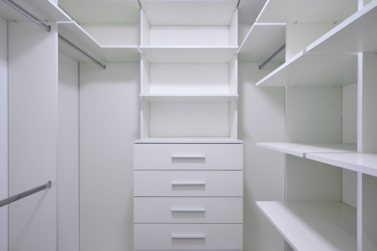 Empty walk-in robe with open shelves and hanging rails, Gold Coast home