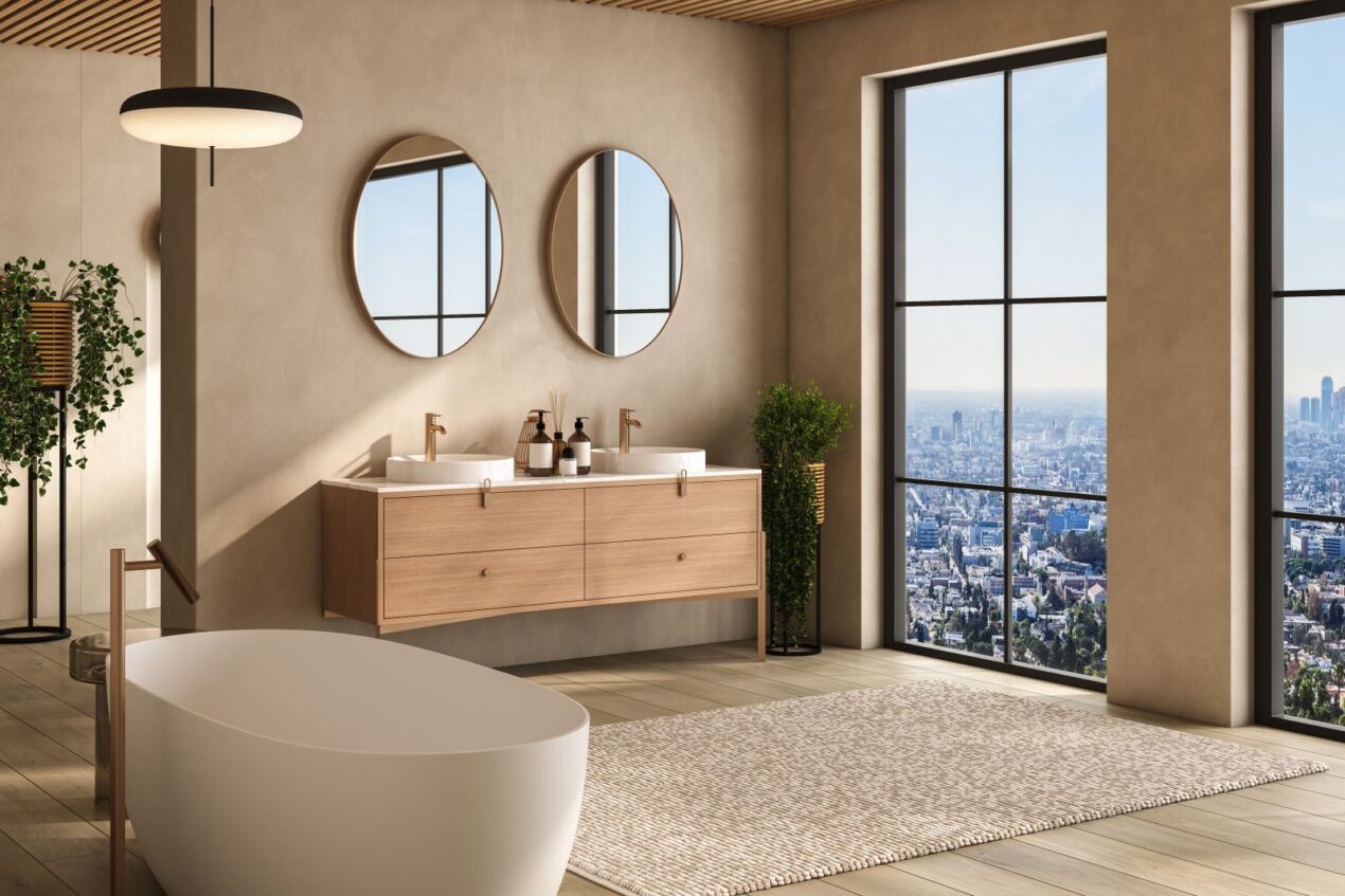 The best bathroom mirror idea is to use two round mirrors over a double vanity.