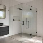 Fluted glass shower screen guide showing a frameless reeded glass screen in a Gold Coast ensuite