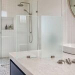 Frosted vs clear shower screen glass comparison in a Gold Coast bathroom