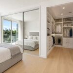 Walk-in wardrobe vs built-in wardrobe cost comparison in a Gold Coast bedroom renovation